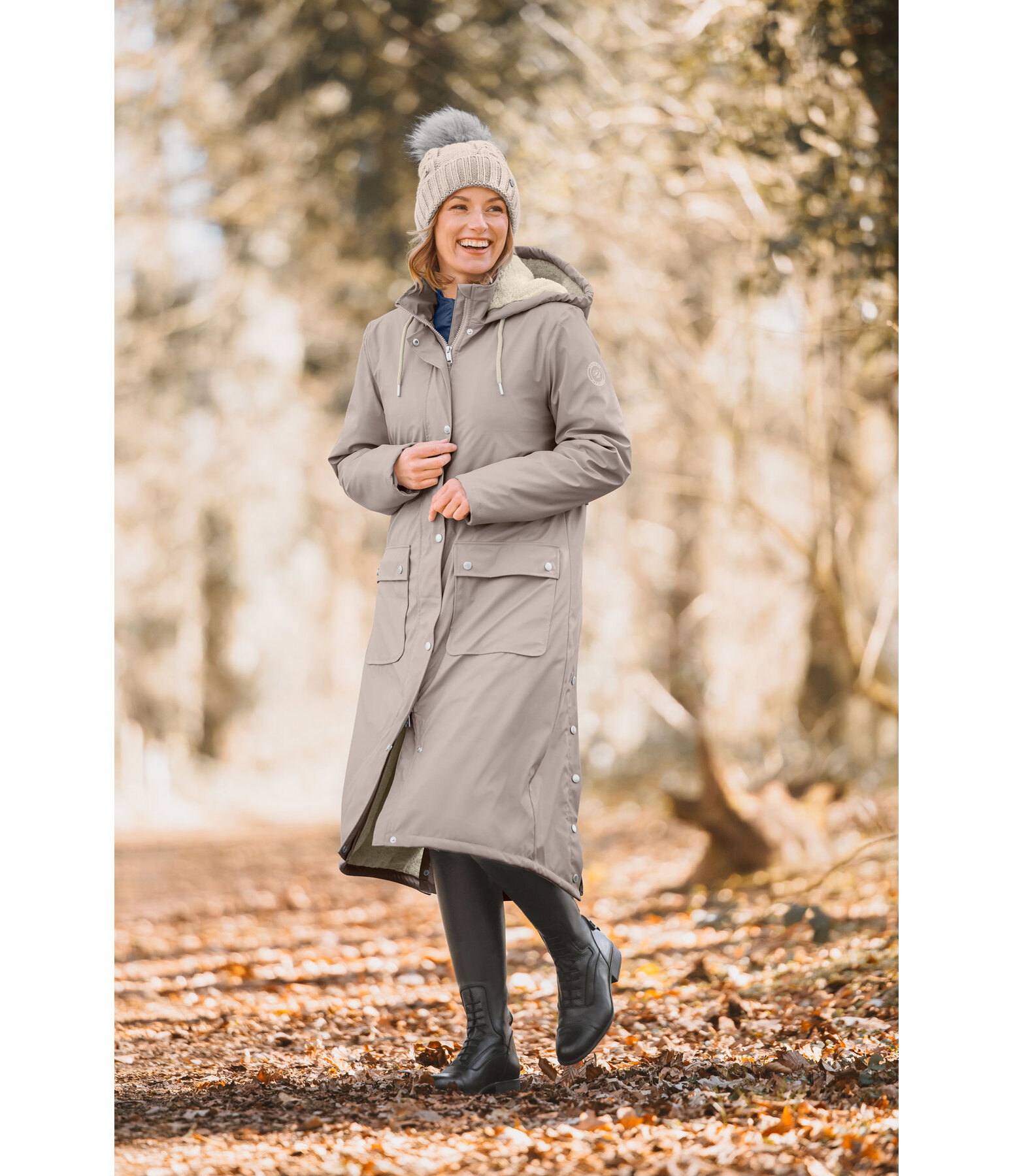 Manteau de pluie long � capuche doubl� en fourrure Teddy  Paris